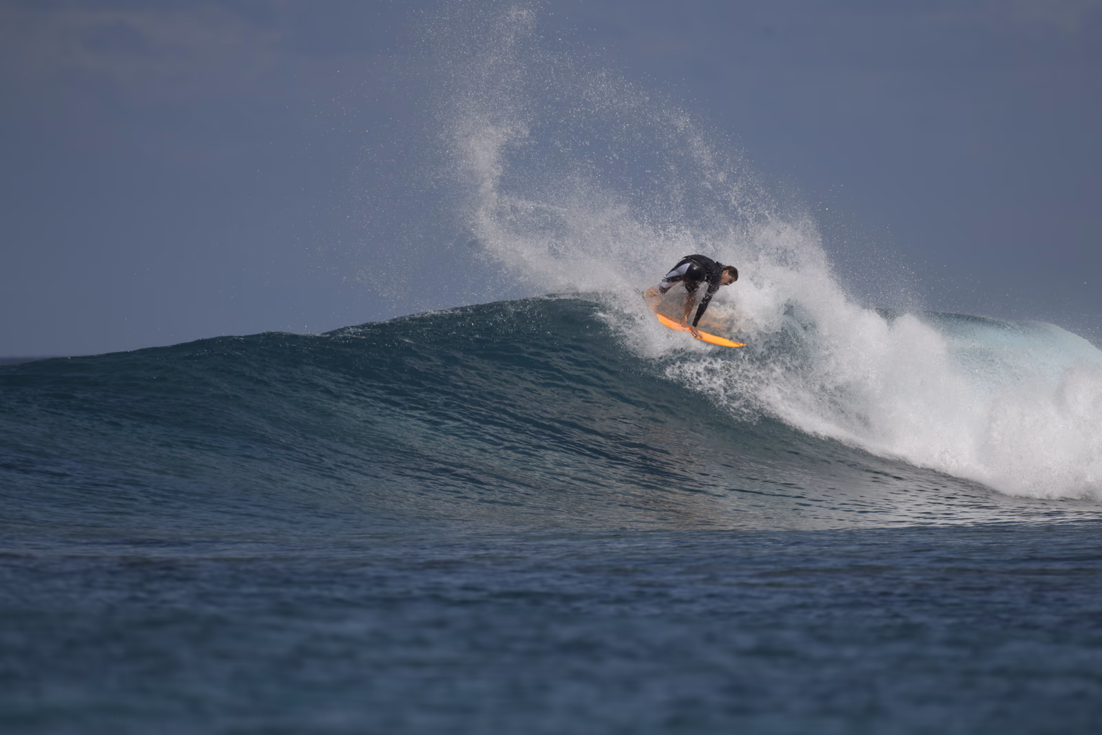 Surfer riding a wave